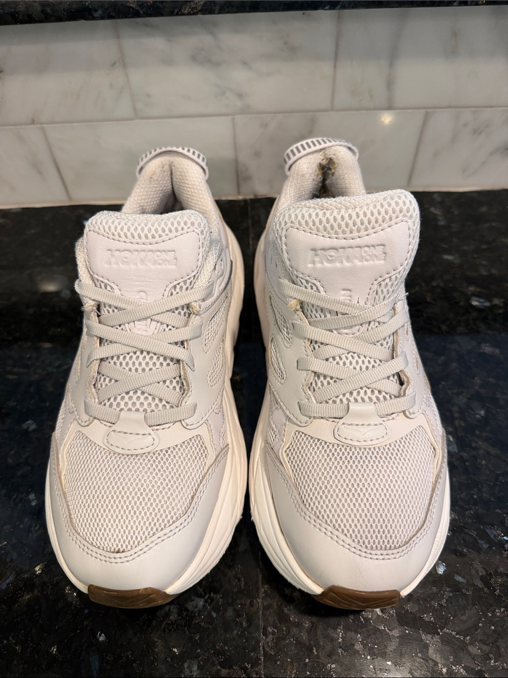 Hoka One One Women's All-White Athletic Sneakers - Picture 2 of 4